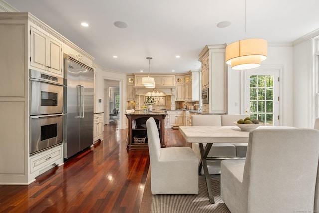 43 Chessor Ln, Wilton, CT 06897 - dining room featuring dark wood finished floors, ornamental molding, and recessed lighting