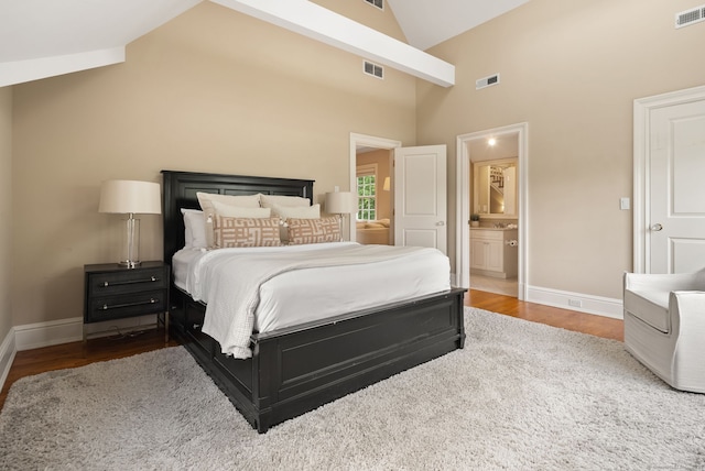 43 Chessor Ln, Wilton, CT 06897 - bedroom with wood finished floors, ensuite bathroom, and high vaulted ceiling