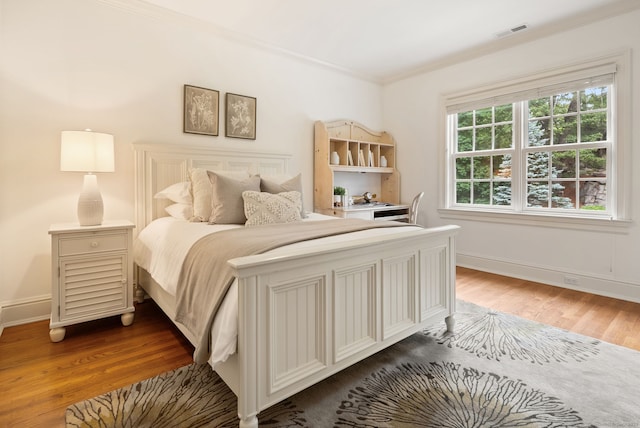43 Chessor Ln, Wilton, CT 06897 - bedroom featuring wood finished floors and ornamental molding