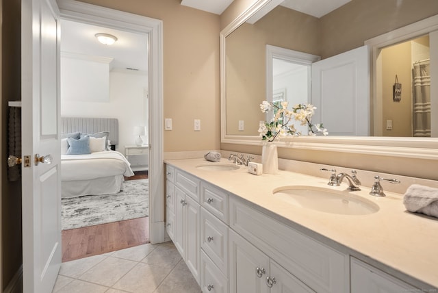 43 Chessor Ln, Wilton, CT 06897 - ensuite bathroom with double vanity and tile patterned floors
