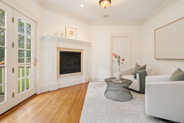 43 Chessor Ln, Wilton, CT 06897 - living room with wood finished floors, plenty of natural light, ornamental molding, and a high end fireplace