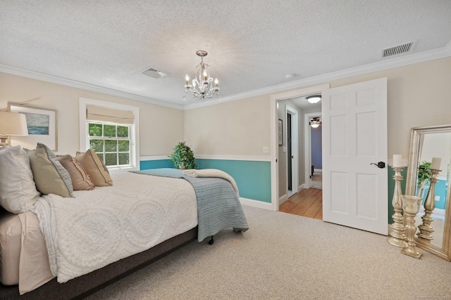 67 Hayden Hill Rd, Haddam, CT 06438 - carpeted bedroom featuring ornamental molding, a chandelier, and a textured ceiling