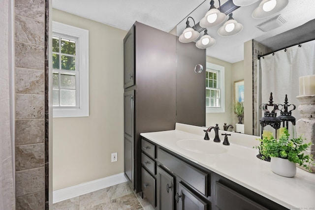 67 Hayden Hill Rd, Haddam, CT 06438 - full bathroom featuring baseboards and vanity
