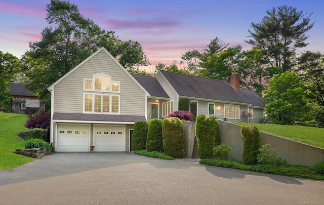 67 Hayden Hill Rd, Haddam, CT 06438 - view of front of house featuring driveway, an attached garage, a chimney, and a yard