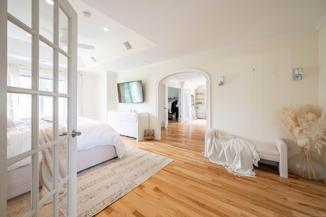 557 Upper Grassy Hill Rd, Woodbury, CT 06798 - unfurnished bedroom with ornamental molding, wood finished floors, and arched walkways