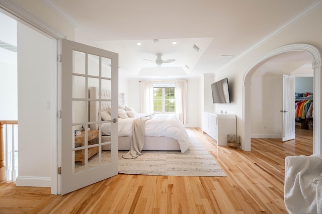 557 Upper Grassy Hill Rd, Woodbury, CT 06798 - bedroom with light wood-style flooring, crown molding, a raised ceiling, recessed lighting, and ceiling fan
