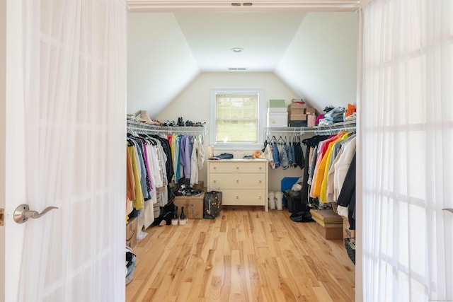 557 Upper Grassy Hill Rd, Woodbury, CT 06798 - walk in closet featuring wood finished floors and vaulted ceiling