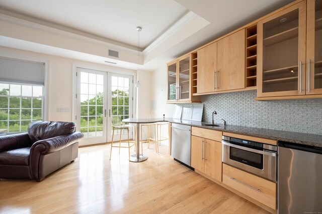 557 Upper Grassy Hill Rd, Woodbury, CT 06798 - kitchen featuring stainless steel appliances, open shelves, light brown cabinetry, light wood finished floors, and tasteful backsplash