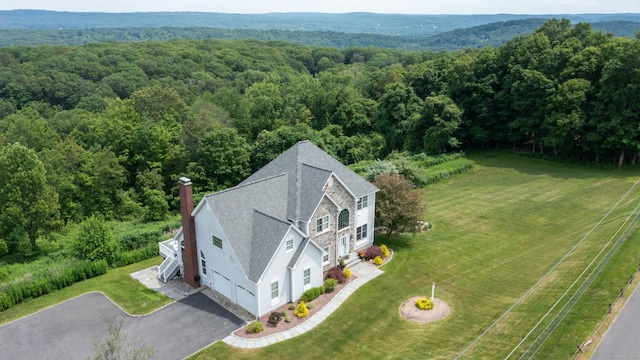 557 Upper Grassy Hill Rd, Woodbury, CT 06798 - aerial view of property and surrounding area featuring a heavily wooded area