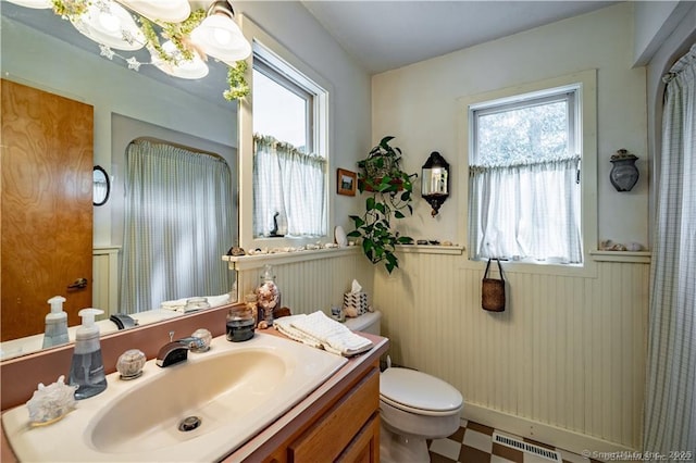166 Old Colchester Rd, Salem, CT 06420 - bathroom featuring a wainscoted wall and vanity