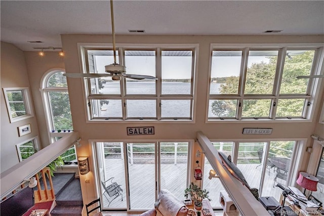 166 Old Colchester Rd, Salem, CT 06420 - detailed view of a ceiling fan, track lighting, and nearby water