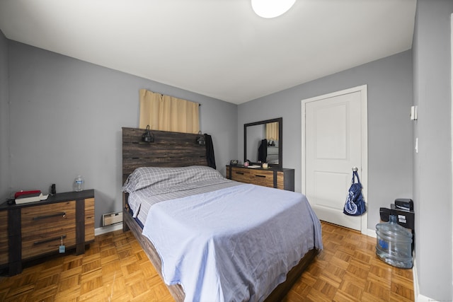 8 Cornfield Rd, Waterbury, CT 06704 - bedroom featuring a baseboard heating unit and baseboards