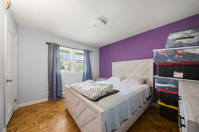 8 Cornfield Rd, Waterbury, CT 06704 - bedroom with a textured ceiling and baseboards