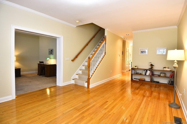 375 Allyn St Unit A4, Groton, CT 06355 - living room with stairway, crown molding, and light wood-type flooring