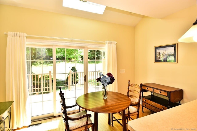 375 Allyn St Unit A4, Groton, CT 06355 - dining room featuring light wood finished floors and a skylight