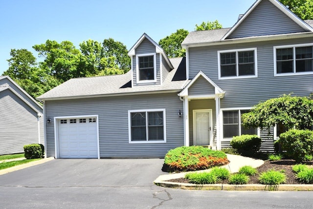 375 Allyn St Unit A4, Groton, CT 06355 - view of front of house featuring an attached garage, asphalt driveway, and a shingled roof