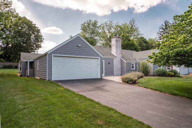 21 Walnut St, Newington, CT 06111 - ranch-style home featuring a garage, driveway, a chimney, and a front yard