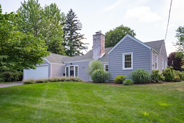 21 Walnut St, Newington, CT 06111 - view of front of home featuring a chimney, driveway, a front yard, a garage, and a shingled roof