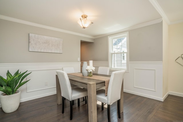 21 Walnut St, Newington, CT 06111 - dining space with ornamental molding, wainscoting, and dark wood finished floors