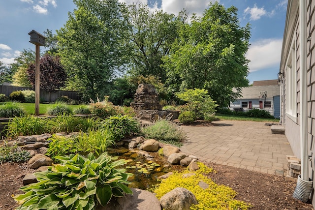 21 Walnut St, Newington, CT 06111 - view of patio / terrace featuring a garden pond