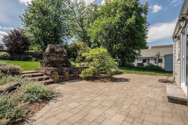 21 Walnut St, Newington, CT 06111 - view of patio / terrace featuring an outdoor stone fireplace
