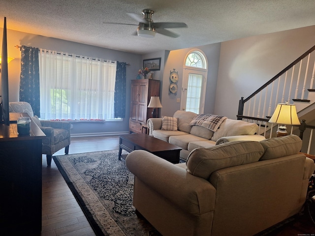 67 Fox Hollow Dr Unit 67, Windsor Locks, CT 06096 - living room with a ceiling fan, stairs, wood finished floors, and a textured ceiling