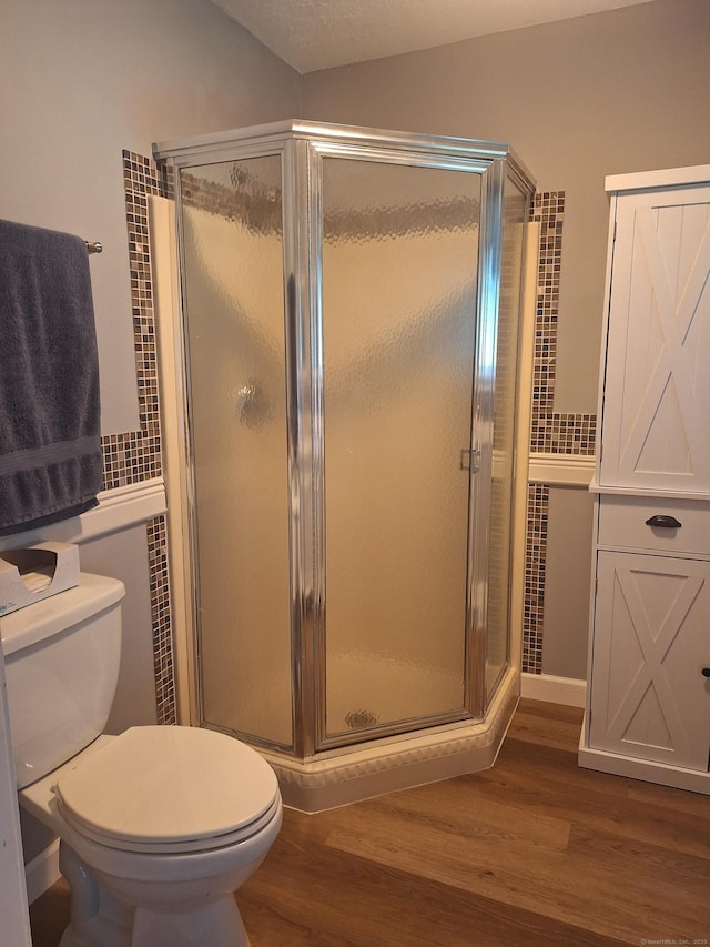 67 Fox Hollow Dr Unit 67, Windsor Locks, CT 06096 - bathroom featuring wood finished floors and a shower stall