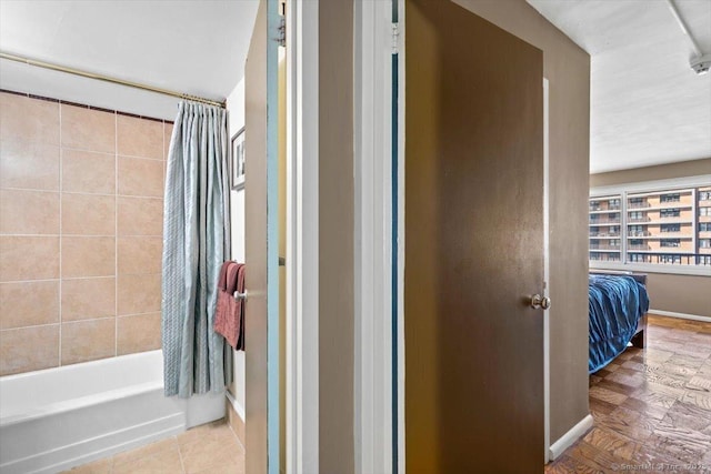 100 York St Unit 11B, New Haven, CT 06511 - bathroom with shower / tub combo with curtain and baseboards