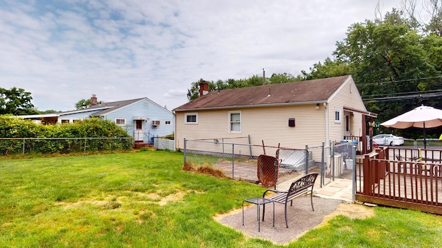 35 Cianci Rd, New Britain, CT 06053 - back of property featuring a fenced backyard, a chimney, and a gate
