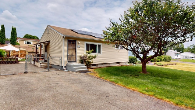 35 Cianci Rd, New Britain, CT 06053 - view of front facade with roof mounted solar panels and a gate
