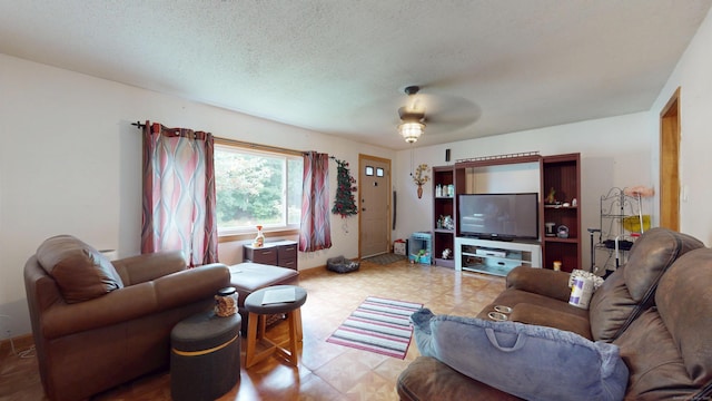 35 Cianci Rd, New Britain, CT 06053 - living area featuring light flooring, a textured ceiling, and a ceiling fan