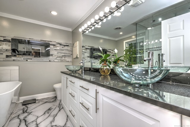 2 Abbey Ln, Newtown, CT 06470 - bathroom featuring double vanity, a soaking tub, a stall shower, marble finish floors, and crown molding