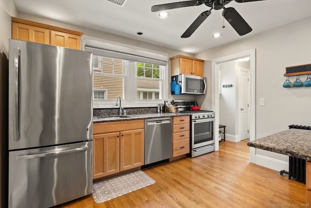 140 Griswold Dr, West Hartford, CT 06119 - kitchen featuring stainless steel appliances, ceiling fan, light wood-style flooring, recessed lighting, and dark stone countertops