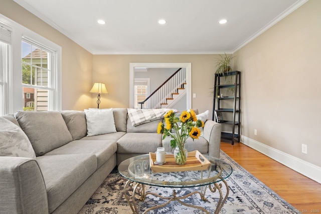 140 Griswold Dr, West Hartford, CT 06119 - living area featuring recessed lighting, wood finished floors, ornamental molding, and stairway