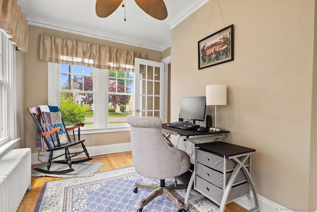 140 Griswold Dr, West Hartford, CT 06119 - office with radiator heating unit, crown molding, a ceiling fan, and light wood-type flooring