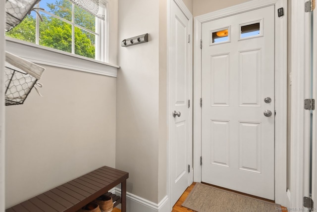 140 Griswold Dr, West Hartford, CT 06119 - mudroom featuring baseboards and wood finished floors