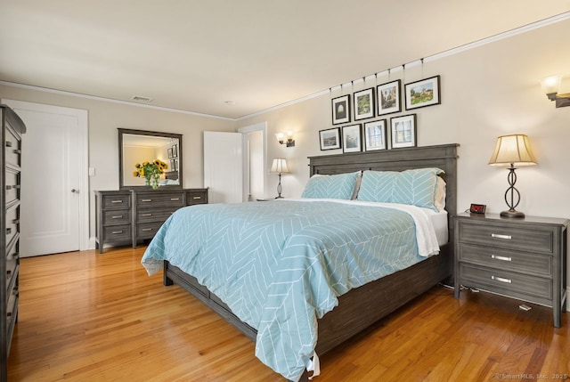 140 Griswold Dr, West Hartford, CT 06119 - bedroom with wood finished floors and crown molding