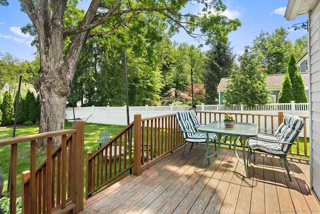 140 Griswold Dr, West Hartford, CT 06119 - wooden terrace featuring a fenced backyard and outdoor dining area
