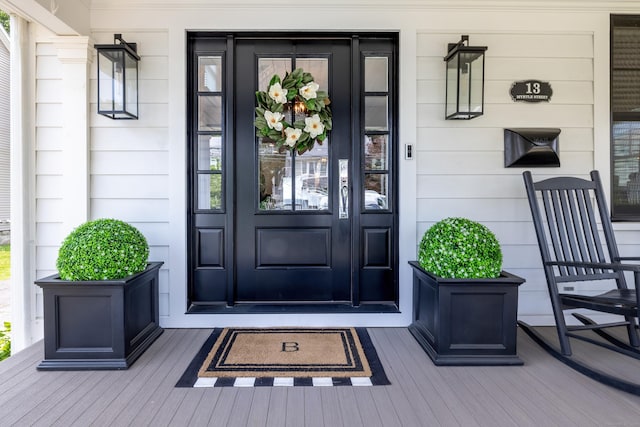 13 Myrtle St, Norwalk, CT 06855 - view of exterior entry featuring a porch