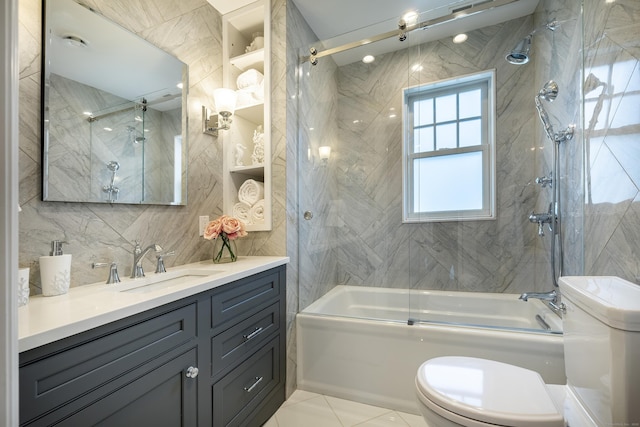 13 Myrtle St, Norwalk, CT 06855 - bathroom featuring shower / bath combination, vanity, tile walls, and tile patterned floors