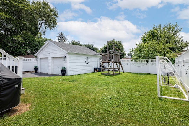 13 Myrtle St, Norwalk, CT 06855 - fenced backyard featuring a detached garage, an outdoor structure, and a playground