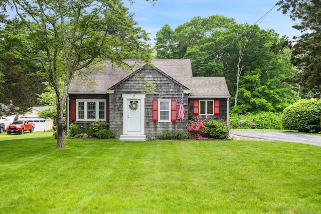 57 Falls Bashan Rd, East Haddam, CT 06469 - view of front facade featuring roof with shingles and a front yard