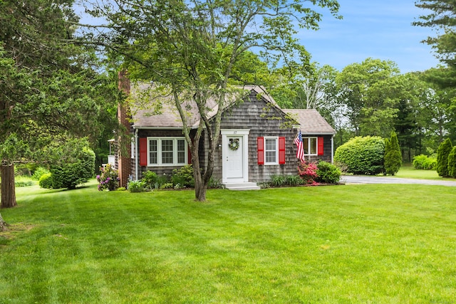 57 Falls Bashan Rd, East Haddam, CT 06469 - view of front of property featuring a front lawn, roof with shingles, and a chimney