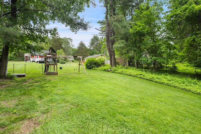 57 Falls Bashan Rd, East Haddam, CT 06469 - view of yard featuring a playground and view of wooded area