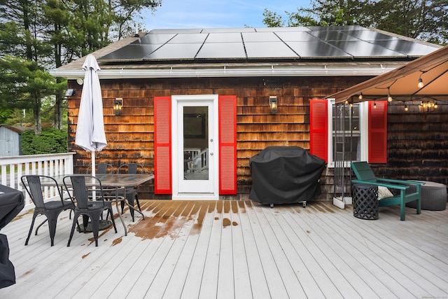 57 Falls Bashan Rd, East Haddam, CT 06469 - wooden terrace featuring a grill, outdoor dining space, and a shed