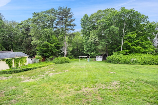 57 Falls Bashan Rd, East Haddam, CT 06469 - view of green lawn featuring a storage unit