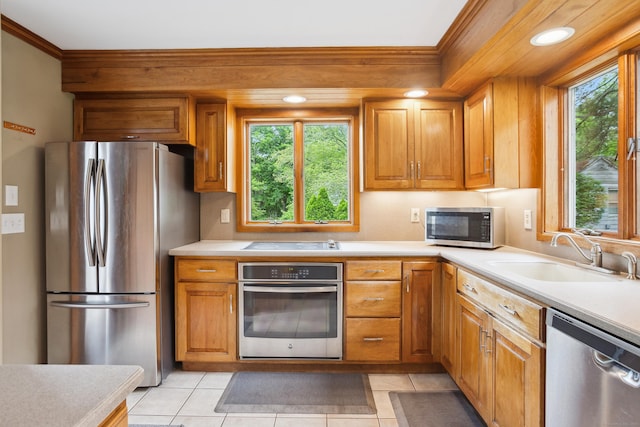 57 Falls Bashan Rd, East Haddam, CT 06469 - kitchen featuring appliances with stainless steel finishes, light countertops, plenty of natural light, and brown cabinets