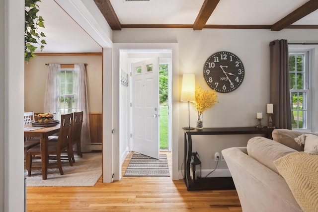 57 Falls Bashan Rd, East Haddam, CT 06469 - foyer featuring wood finished floors, beam ceiling, and baseboard heating