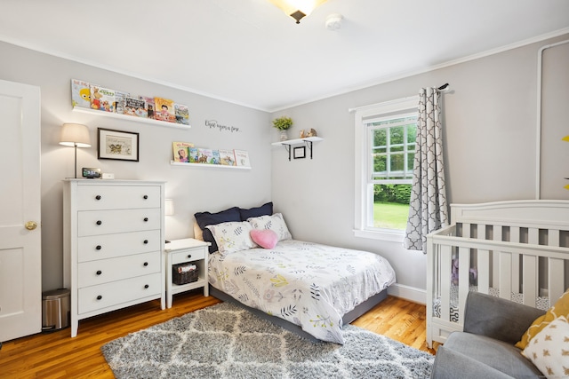 57 Falls Bashan Rd, East Haddam, CT 06469 - bedroom featuring wood finished floors and crown molding