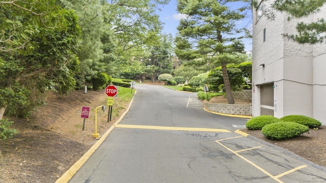 3200 Park Ave Unit 9B1, Bridgeport, CT 06604 - view of asphalt road featuring traffic signs